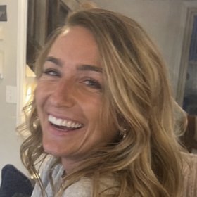 A Vivid Properties team member with a big smile